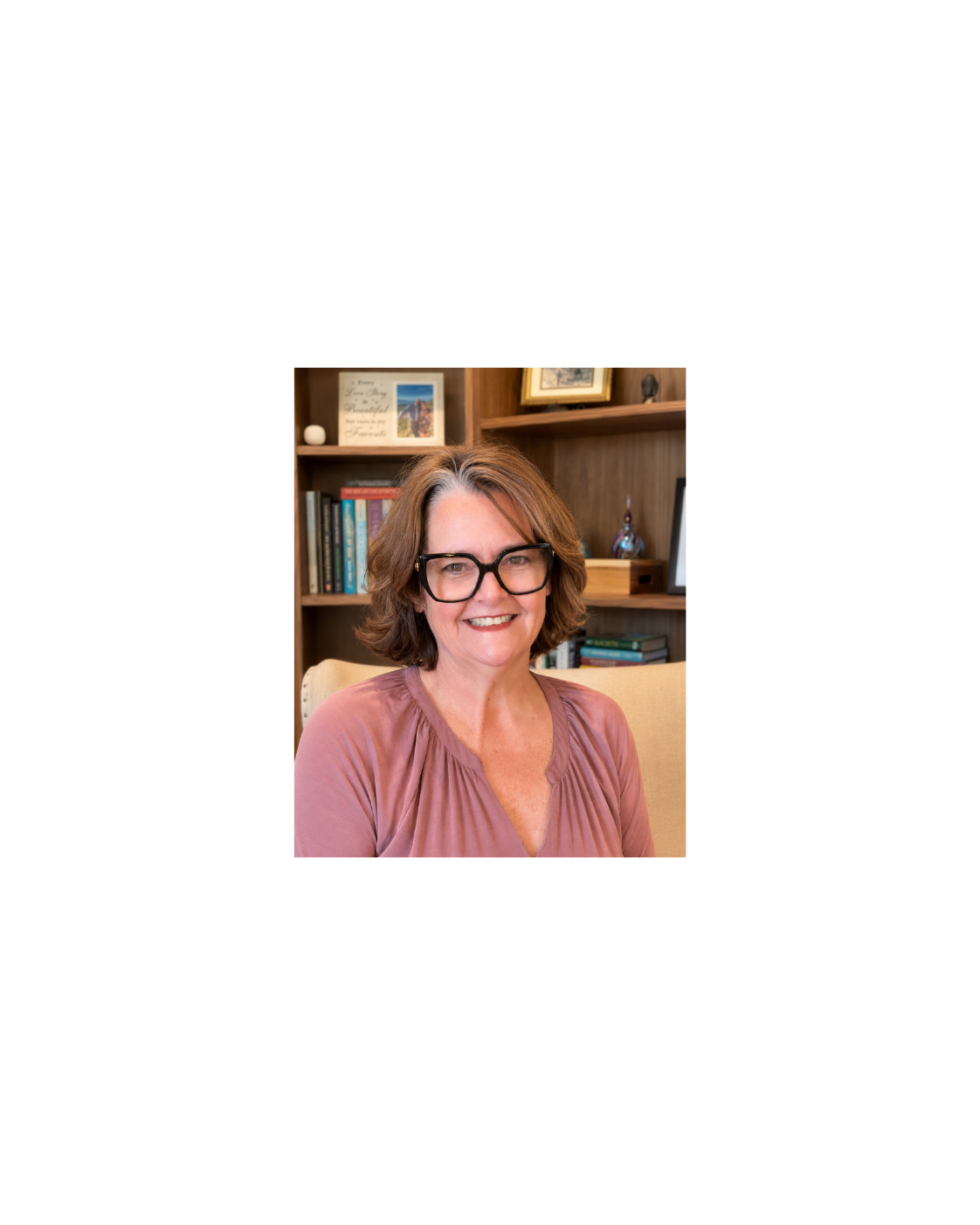 Portrait of Dr. Susan Olsen in her home library